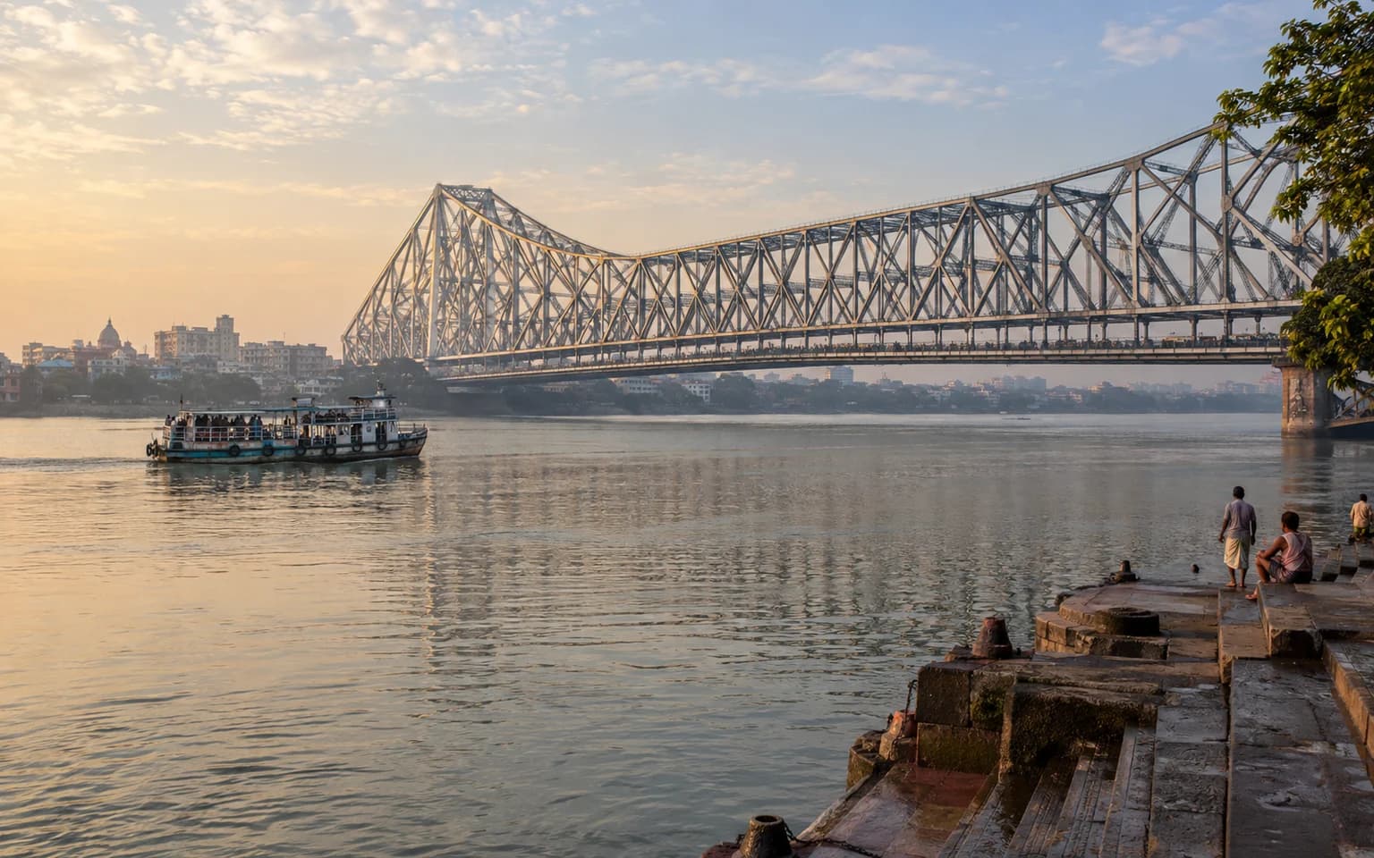 Howrah Bridge spanning the river in Kolkata